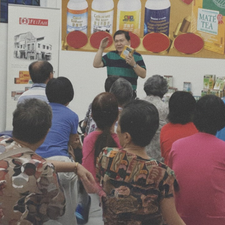 feifah factory tour. guide giving a talk